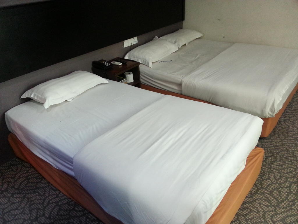 Oriental Inn Κουτσίνγκ Δωμάτιο φωτογραφία