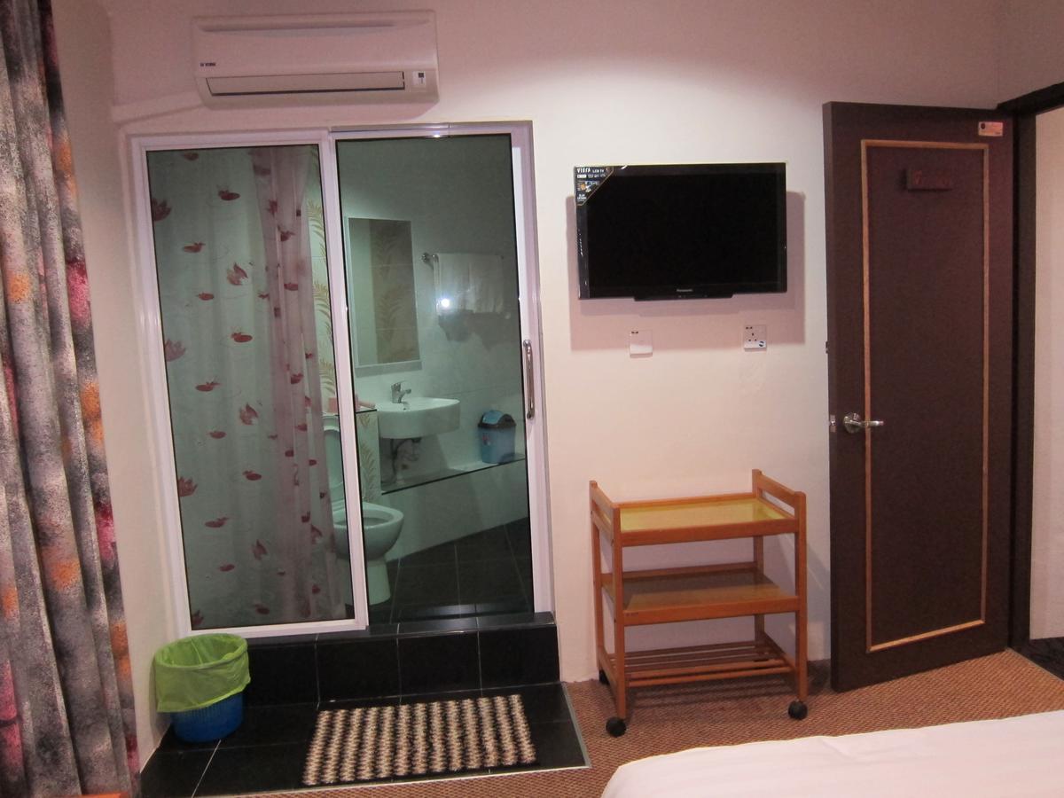 Oriental Inn Κουτσίνγκ Εξωτερικό φωτογραφία